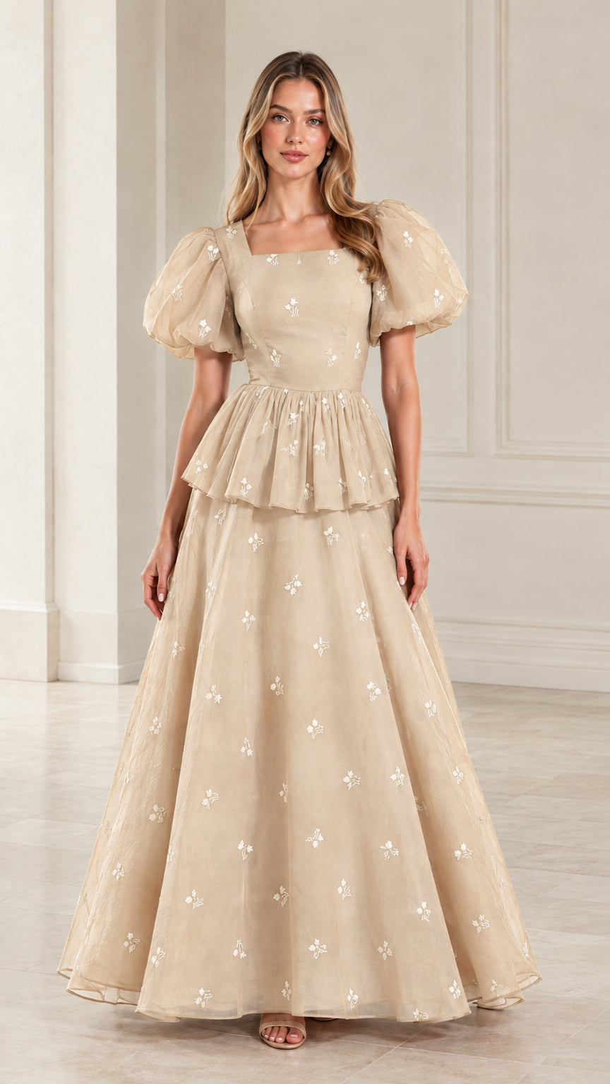 Full-length view of woman wearing champagne beige embroidered puff sleeve formal gown