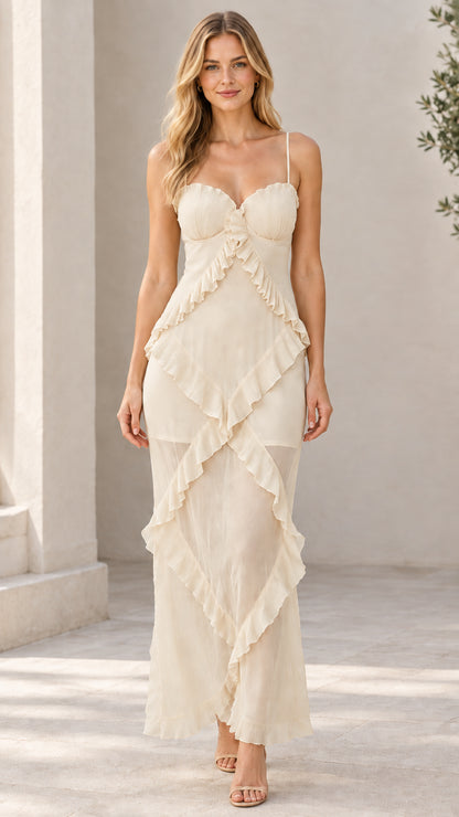 Front view of model wearing cream off-white sweetheart cascading ruffle cami maxi dress