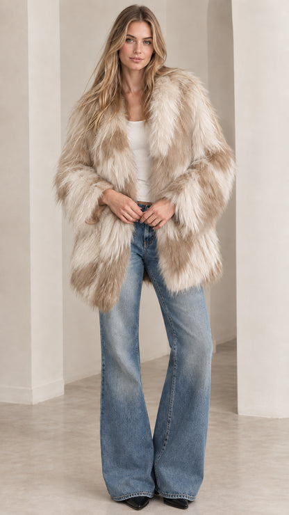 Model wearing beige and cream chevron shaggy faux fur coat